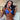 A pair of long, chandelier-style bikini jewelry earrings with silver and multicolored AB rhinestones, displayed by an npc bikini fit model.