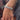 Video showing a silver bikini jewelry bracelet adorned with clear oval and round cut cubic zirconia rhinestones.