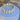 Video showing a clear marquise crystal stretch bikini jewelry bracelet with a silver finish, displayed against a blue surfaced background.