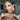 Clear silver marquise rhinestone bikini jewelry earrings with a crystal stone leaf cluster, displayed by a bikini and figure competition model.