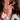 A clear silver rhinestone stretch bikini jewelry ring displayed by a bikini and figure competition model.