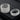 A pair of clear silver rhinestone bikini jewelry bracelets.