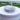 Video showing a clear silver 4 row stretch bikini jewelry bracelet with rhinestones displayed on a white table..